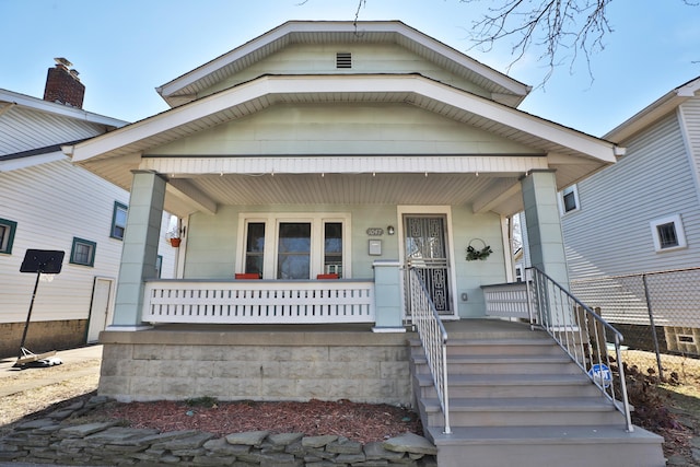 bungalow-style house featuring covered porch