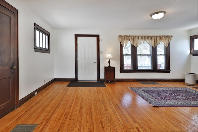 entrance foyer with hardwood / wood-style floors