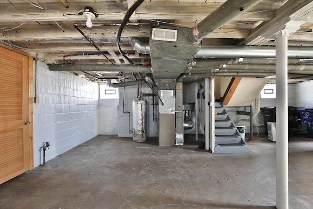 basement with heating unit and gas water heater