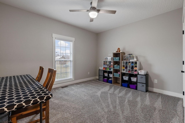 office featuring carpet floors and ceiling fan