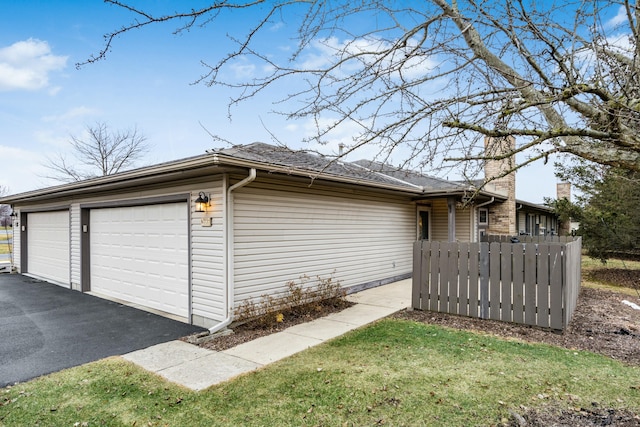 view of home's exterior with a garage