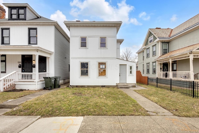 view of front of property featuring entry steps, a porch, fence, crawl space, and a front lawn