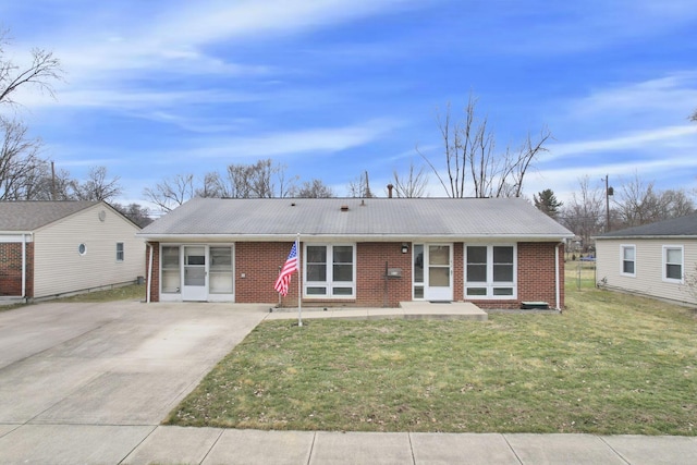 ranch-style house with a front yard