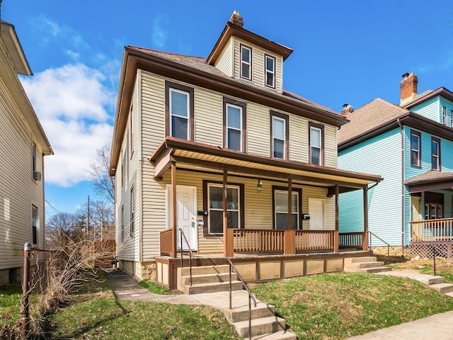 traditional style home with a porch