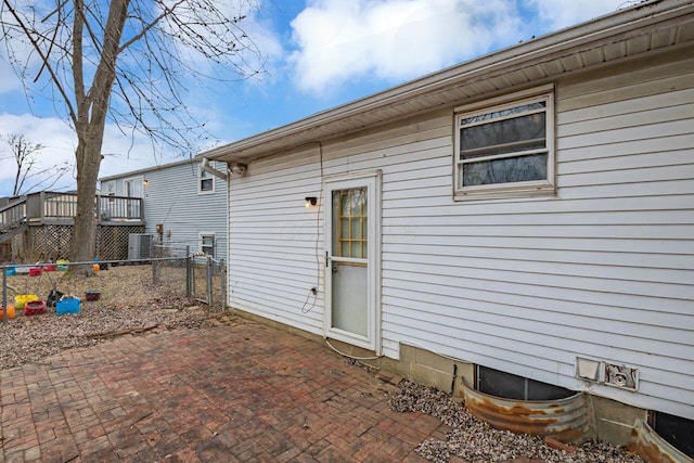 back of property with a patio and fence