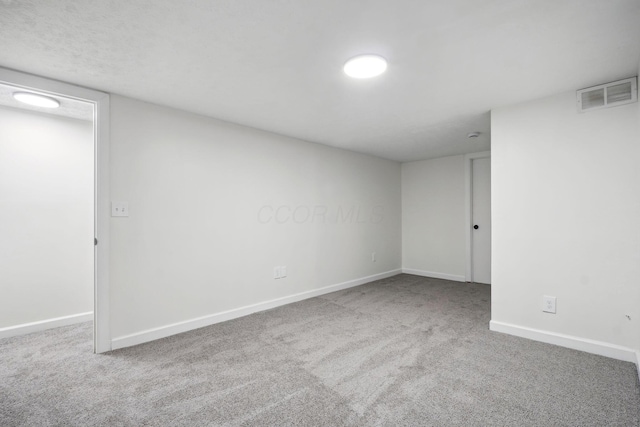 basement featuring carpet floors