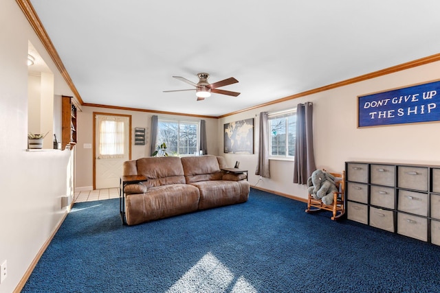 living area with carpet flooring, crown molding, and baseboards