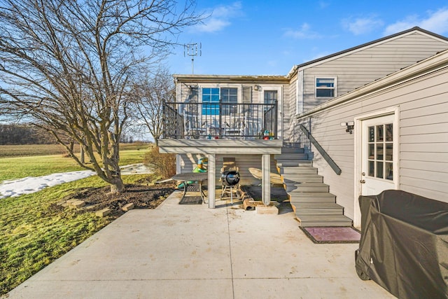 back of house with a patio area and stairway