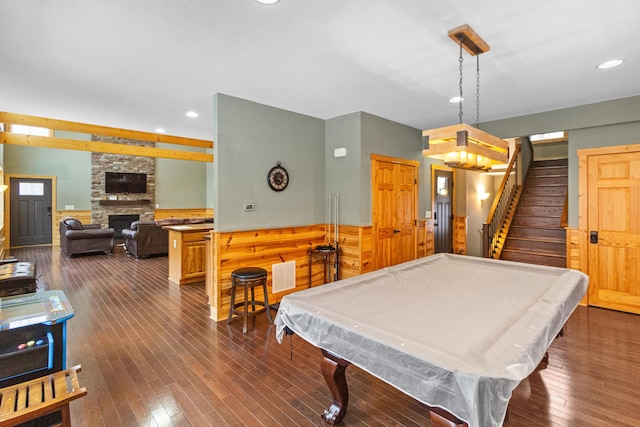 recreation room featuring pool table, dark hardwood / wood-style floors, and a fireplace