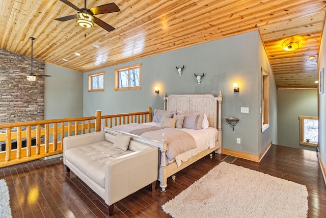 bedroom with vaulted ceiling, dark hardwood / wood-style floors, and wood ceiling