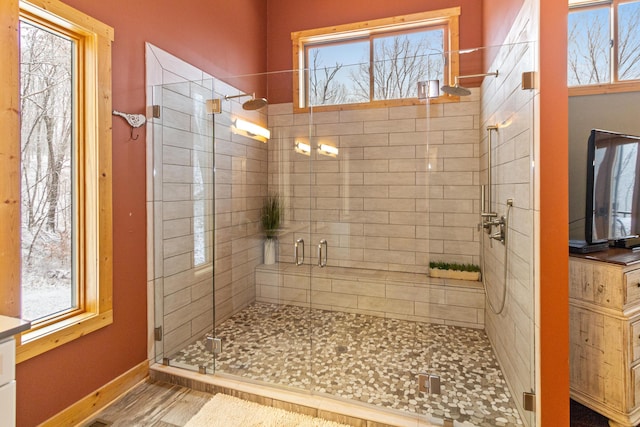 bathroom featuring an enclosed shower