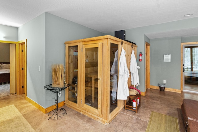 interior space with a textured ceiling