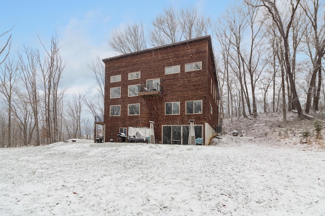 view of snow covered house