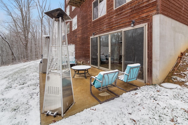 view of snow covered patio