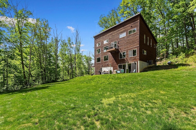 18004 Buckingham Rd, Logan, OH 43138 - rear view of property with a yard and a balcony