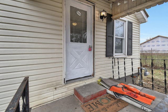 property entrance with fence