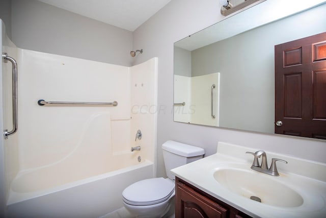 full bathroom with vanity, toilet, and shower / washtub combination