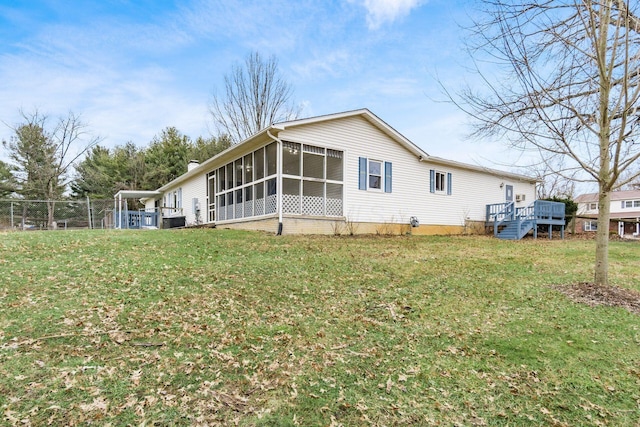 view of property exterior with a yard, fence, cooling unit, and a sunroom