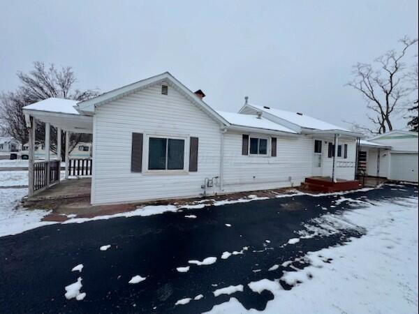 view of snow covered property