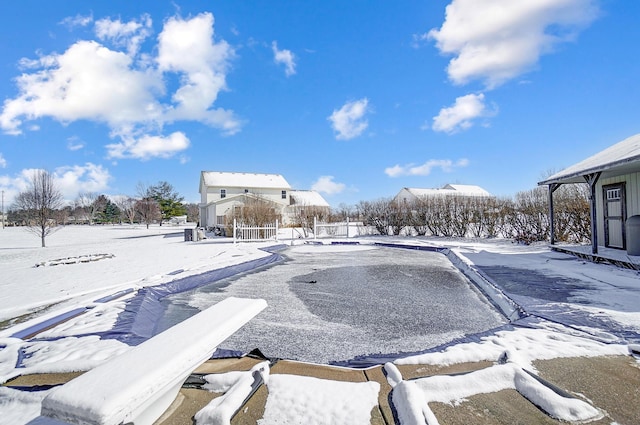 view of yard layered in snow