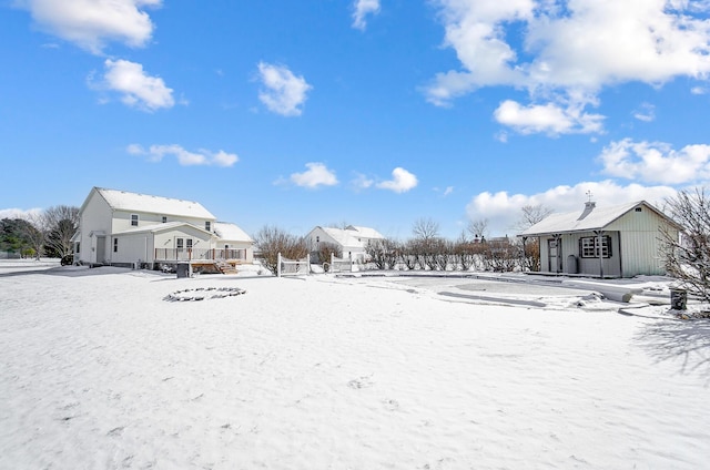 view of yard covered in snow