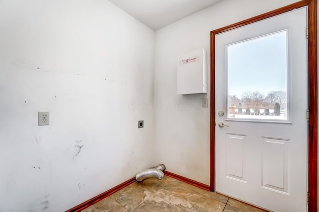 clothes washing area with hookup for an electric dryer