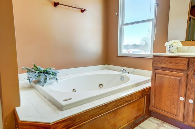 bathroom with vanity and a bathtub