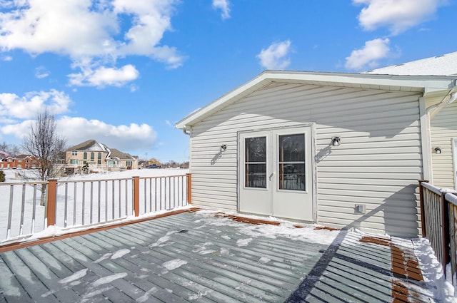 view of snow covered deck