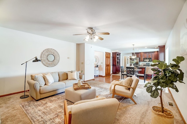 living room featuring ceiling fan