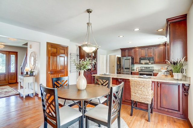 dining area featuring light hardwood / wood-style flooring