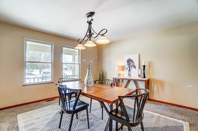 dining room with carpet