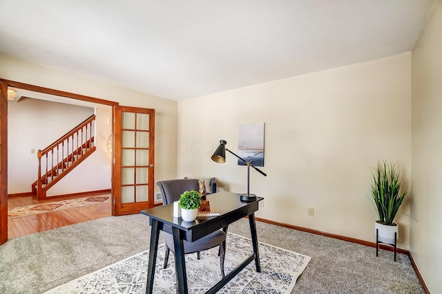 home office featuring french doors and carpet floors