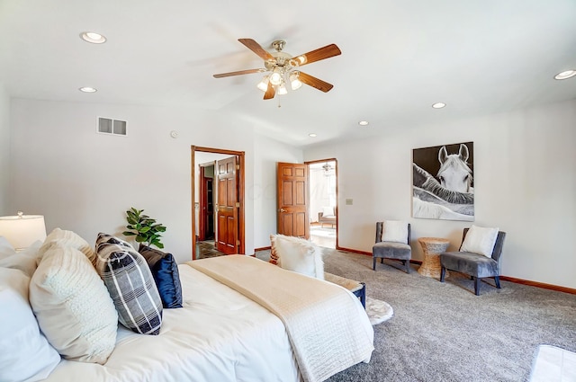 carpeted bedroom with vaulted ceiling and ceiling fan