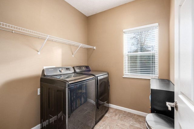 laundry area featuring separate washer and dryer