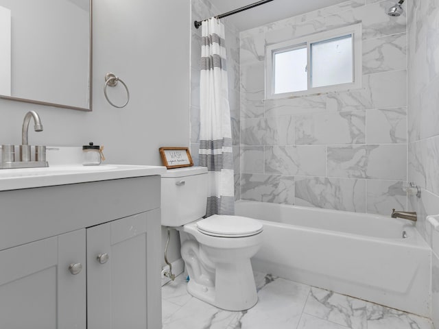 full bathroom with vanity, shower / tub combo, and toilet