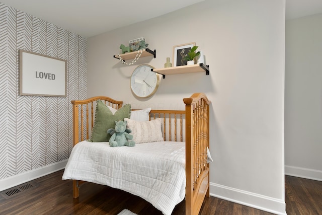 bedroom featuring dark wood-type flooring