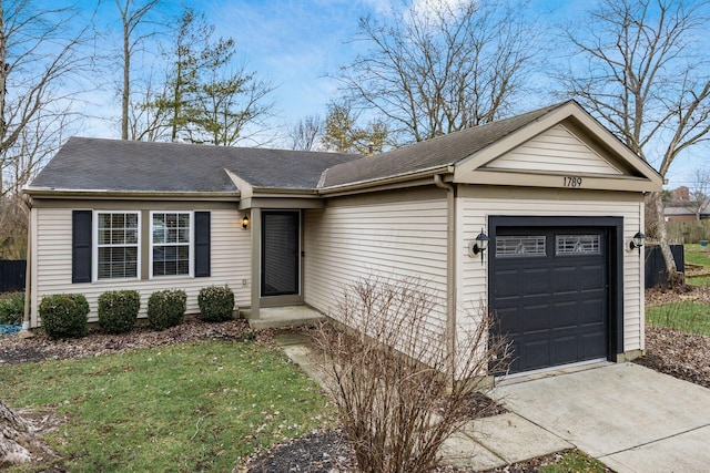 ranch-style home featuring a garage