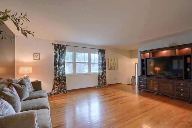 living room with light hardwood / wood-style floors