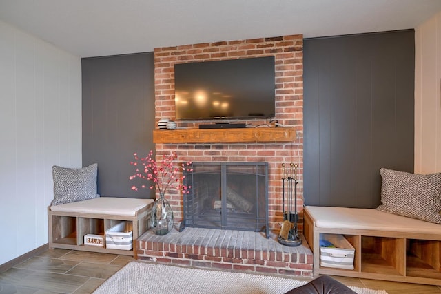 living room featuring a fireplace