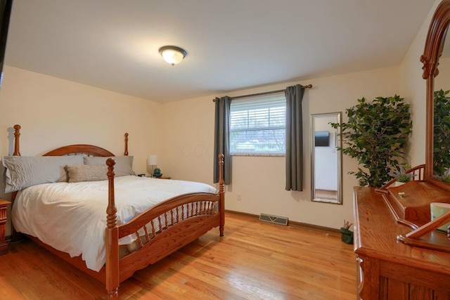 bedroom featuring light hardwood / wood-style flooring