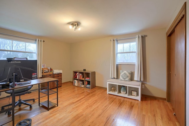 office area with light wood-type flooring