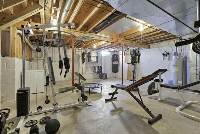 workout room with washer / clothes dryer and water heater