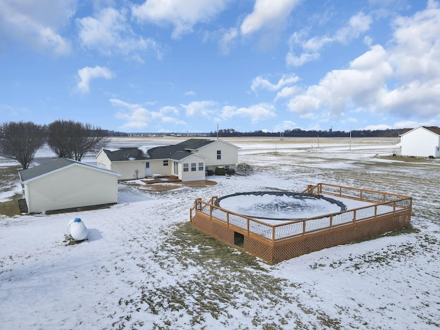 view of yard covered in snow