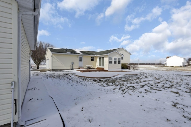 view of snow covered property