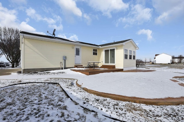 view of snow covered property