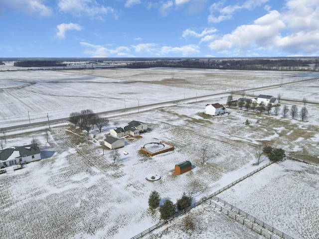 snowy aerial view with a rural view