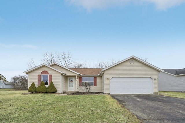 ranch-style house with driveway, a garage, and a front yard