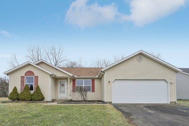 ranch-style home featuring a garage, a shingled roof, aphalt driveway, and a front yard