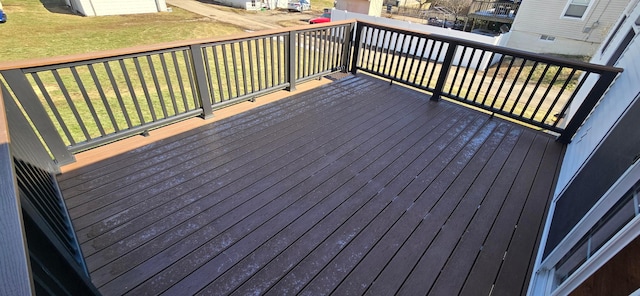 wooden deck with a yard