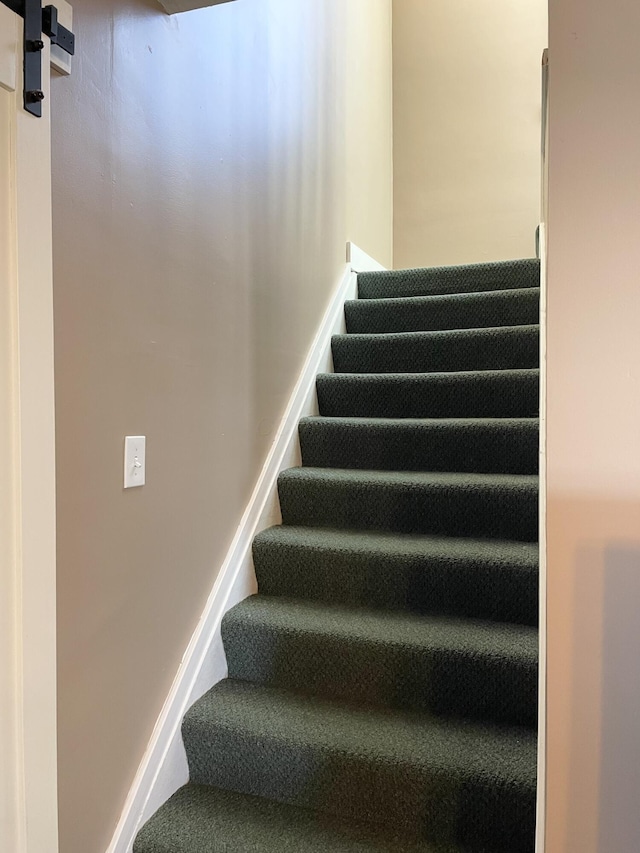 stairway with a barn door